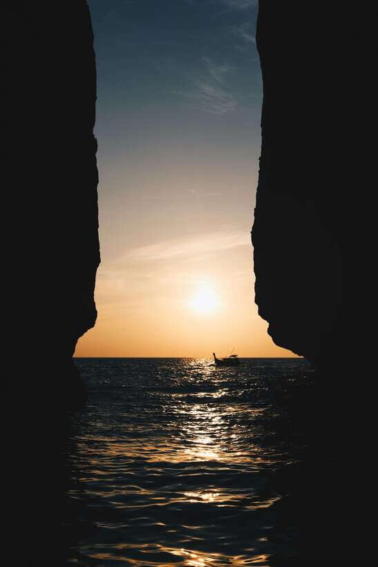 From Phi Phi: Full Day by Longtail Boat with Sunset - Pi Leh Lagoon: The Swim-and-Snorkel Moment You’ll Remember