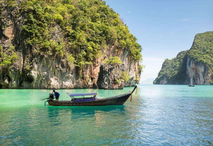 From Phi Phi islands: Phi Phi, Maya Area by longtail Boat - Monkey Beach and Viking Cave: quick stops with big atmosphere