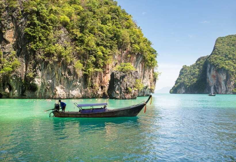 From Phi Phi islands: Phi Phi, Maya Area by longtail Boat - Pileh Lagoon and Loh Samah Bay: where the water does the selling