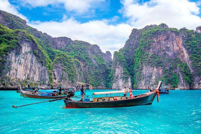 From Phi Phi islands: Phi Phi, Maya Area by longtail Boat - Maya Bay: timing it for fewer crowds or better light