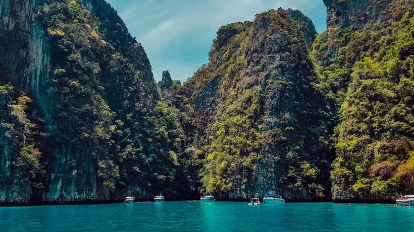 From Phi Phi: Maya Bay HalfDay Longtail Boat with Snorkeling - Monkey Beach and Viking Cave: wildlife watching and limestone art