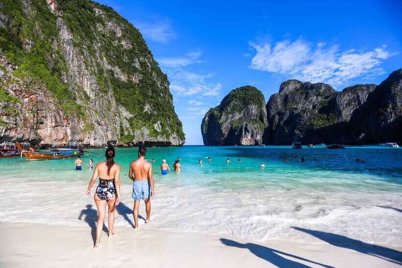 Krabi: Phi Phi Islands Speedboat Tour with Buffet Lunch - Pileh Lagoon: The Emerald Water Moment Behind the Cliffs