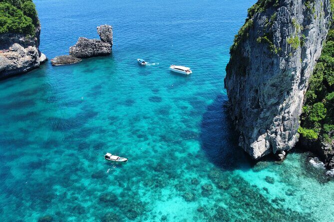 One Day Phi Phi, Maya And Khai Islands Adventure - Pileh Bay and Pileh Lagoon: swimming with limestone cliffs