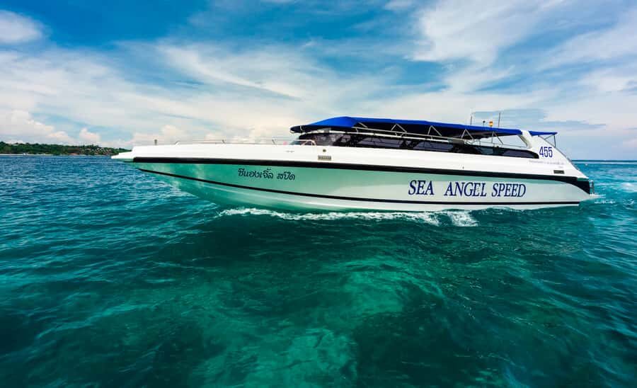 Phuket: Speedboat Day Trip to Phi Phi and Maya Bay - Phi Phi Don lunch and beach-walk time (with shopping)