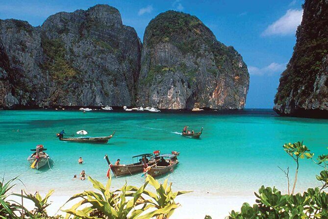 VIP Private Boat to Phi Phi Island: Snorkeling + Land Tour - Entering the Phi Phi loop with a private speedboat